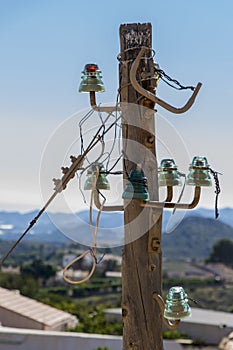 Old power lines on a wooden pole