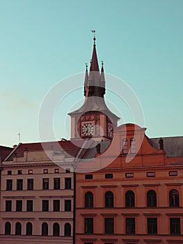 Old Prague clock tower. Picturesque European houses