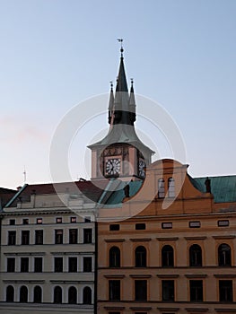 Old Prague clock tower. Picturesque European houses