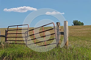 Old prairie pasture metal gate.