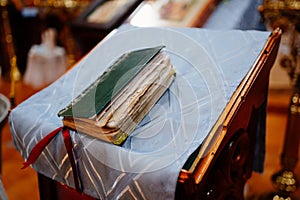 Old prayer book. Lectern is a stand for icons and books. Orthodox Church.