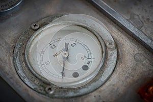 Old pressure gauge on autoclave, pressure gauge in production pr