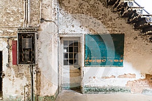 Old prison place with cleaning tools