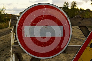 Old prohibiting forward traffic sign on road