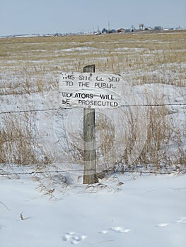 Old prohibition sign in the winter area of Fort MacLeod, Alberta, Canada