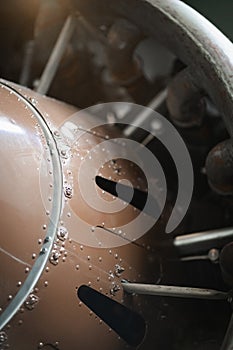 Old propeller airplane engine, closeup of machine details