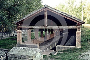 The old public laundry with clear freshwater in Sepulveda, Segovia, Spain. `Prohibido lavar coches` translation `No Car washing`. photo