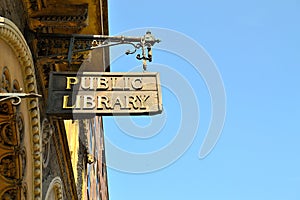 old public library sign