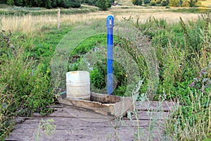 Old public pump for water from an underwater well