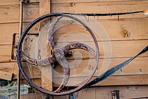 Old pulley in an old agricultural machine. Threshing machine, pu