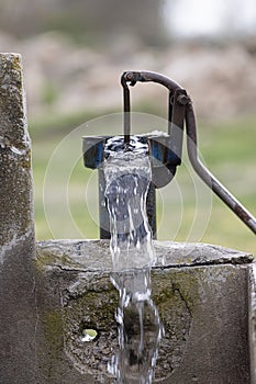 Old pump used to extract water from the field in Turkey.