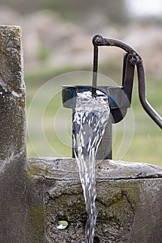 Old pump used to extract water from the field in Turkey.