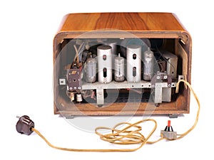 Old Radio, with 60 years of last century, on a white background, shot showing the interior of the electronics