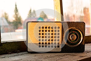 Old radio on windowsill