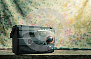 Old radio on wooden table