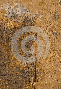 Old ragged Painted orange wall