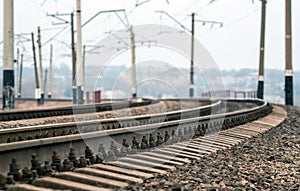 Old railroad rails and poles with wires