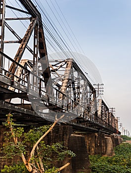 Old railroad tracks on Black Bridge or Lampang Railway Bridge