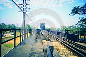 Old railroad tracks on Black Bridge or Lampang Railway Bridge. Railway bridge on river at Lampang thailand