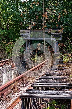 Old railroad tracks with buffer