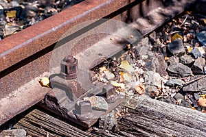 Old railroad tracks with screws and bolt