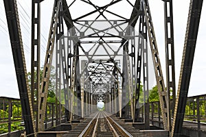 Old railway black bridge in lampang, Thailand