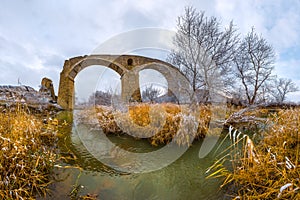 An old railway bridge in the steppe.