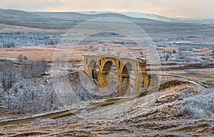 An old railway bridge in the steppe.