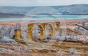 An old railway bridge in the steppe.