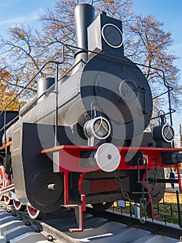 Old railway locomotive. Retro transport