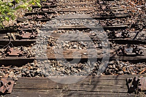 Old railway, railroad, rail track , abandoned, destroyed and overgrown wood