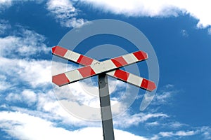 Old railway sign in the blue sky