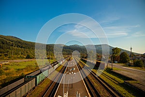 old railway station in picturesque mountains natural environment space in summer clear weather day