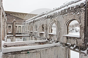 Old railway station at winter with painted walls