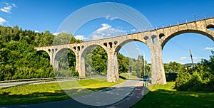 Old railway viaduct in the mountains above the road, Lewin Klodzki