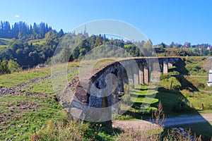 Old railway viaduct in the village of Vorokhta. photo