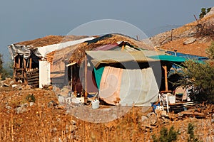 Old ramshackle cabins, temporary houses, derelict huts of poor homeless people