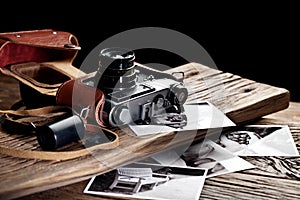 Old rangefinder camera and black-and-white photos.