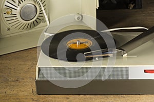 Old record player playing a vinyl