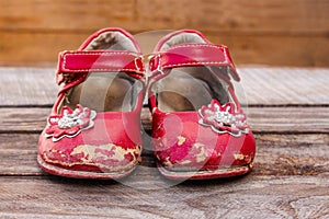 Old red baby shoes