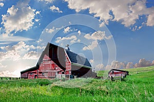 An old red barn partially faded.