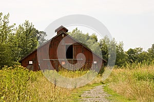 Old Red Barn in Weeds