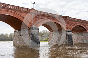 The old red brick bridge across the Venta river. Kuldiga, Latvia
