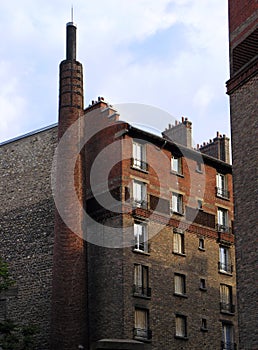 Old red brick building in Paris suburb