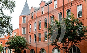 Old Red Brick Building with Turret Windows