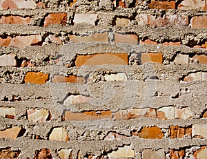 Old red brick and concrete wall background