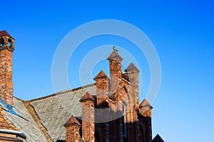 Old red brick house in the English Gothic revival style