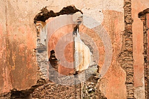 Old red brick/ stone walls of abandoned houses, background/ texture.