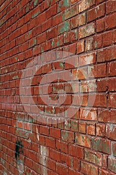 Old red brick wall in a background image. Texture background. Vintage