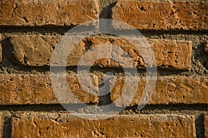 Old red brick wall background texture.